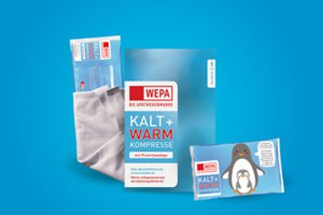Kalt/ Warmkompresse Verpackung und Pinguin Kompresse